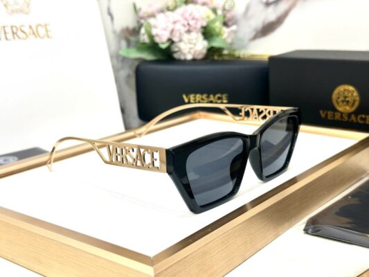Full rim shield black lenses, golden alphabet frame UV protected